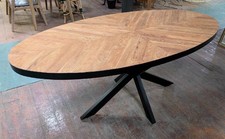 Oval dining table with